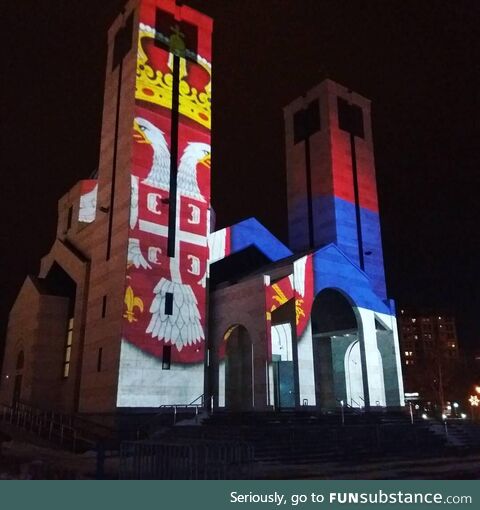 Serbian flag projected on church walls