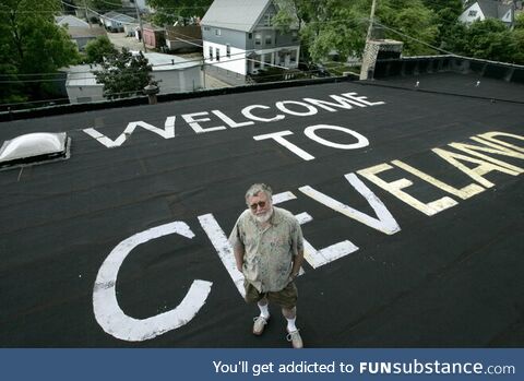 Mark Gubin has maintained a “Welcome to Cleveland” sign painted on the roof of his