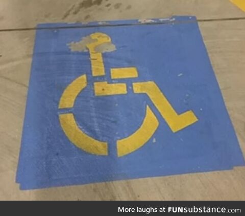 Paint chipping away on this wheelchair guy is making him seem like an angry old man