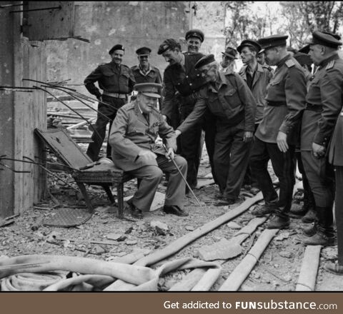 Winston Churchill sitting on Hitler’s armchair (1945)