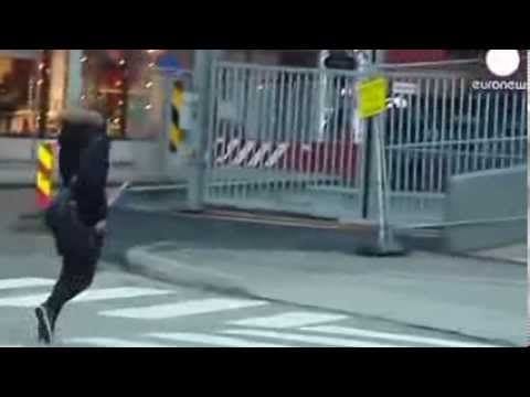 People Walking Against the Wind in Norway