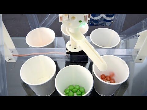 Genius machine sorts Skittles and M&M's by color so you don't have to